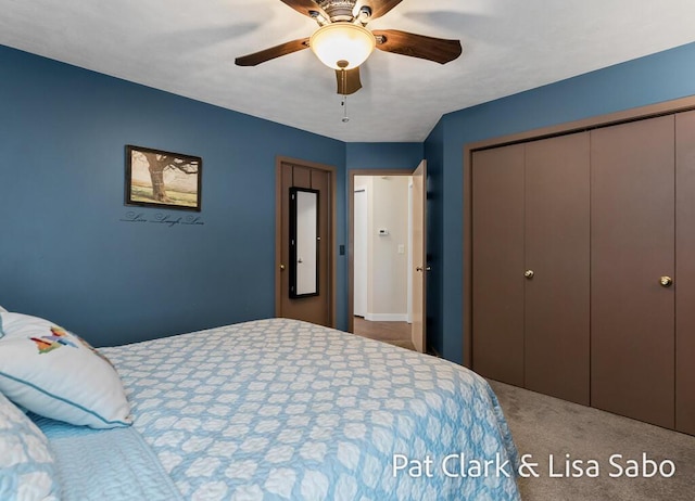 carpeted bedroom featuring ceiling fan