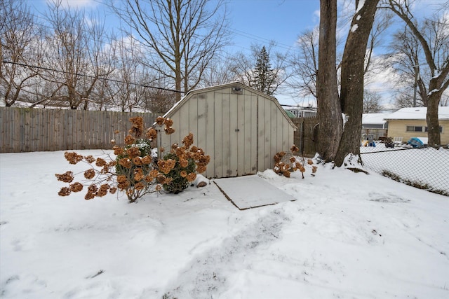 view of yard layered in snow