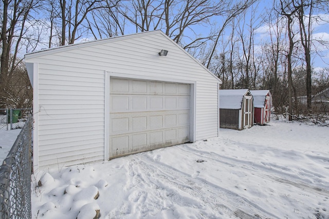 view of snow covered garage