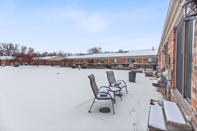 view of snow covered patio