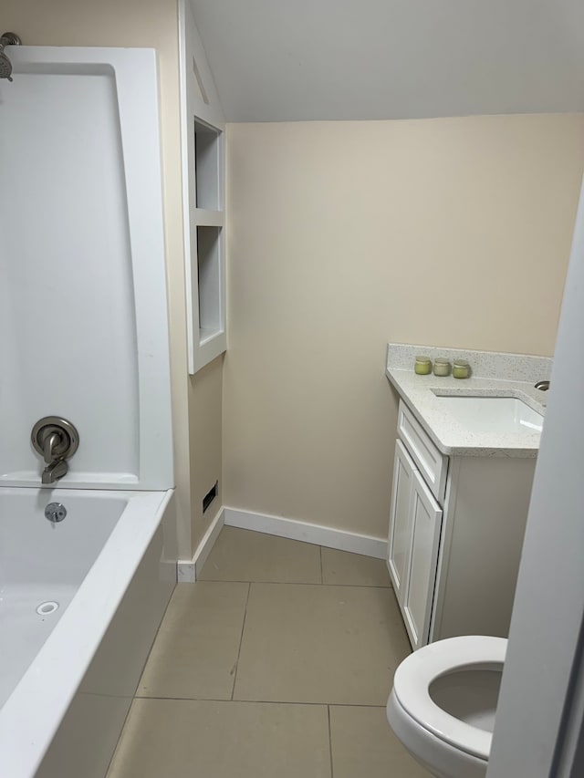 full bathroom with bathtub / shower combination, tile patterned floors, toilet, and vanity