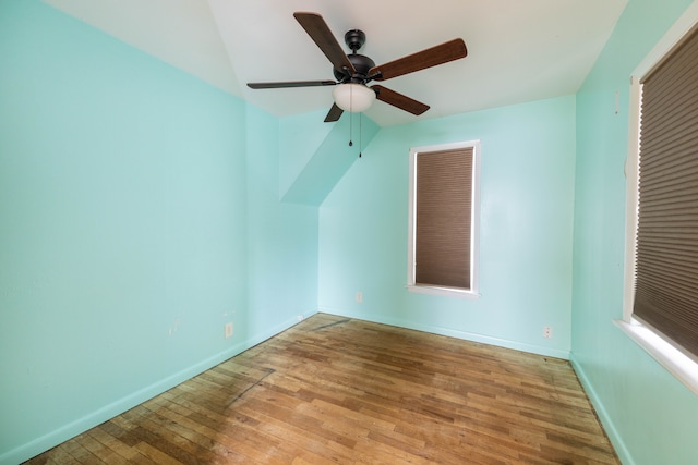 additional living space featuring ceiling fan, lofted ceiling, and light hardwood / wood-style flooring