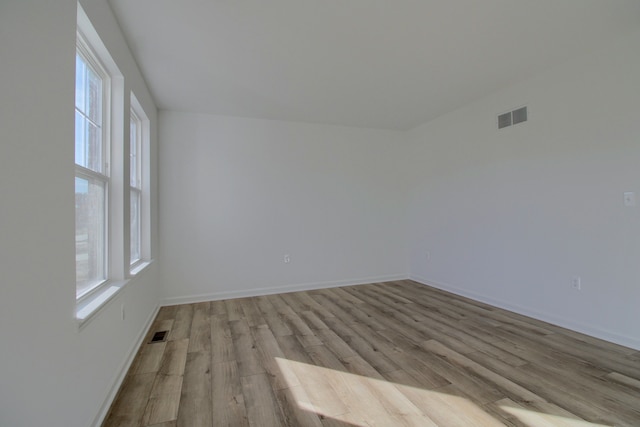 empty room featuring light hardwood / wood-style floors