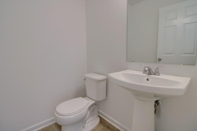 bathroom featuring toilet