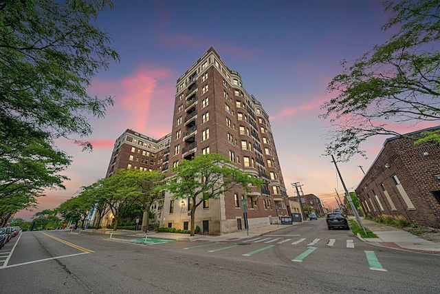 view of outdoor building at dusk