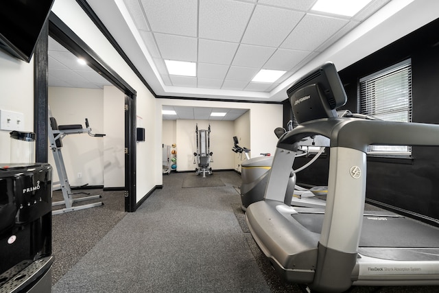 workout area with a drop ceiling