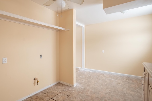 clothes washing area with ceiling fan