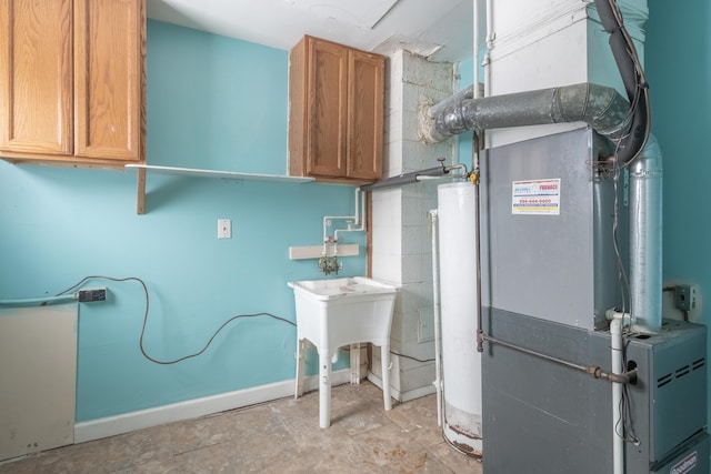 utility room with water heater and heating unit