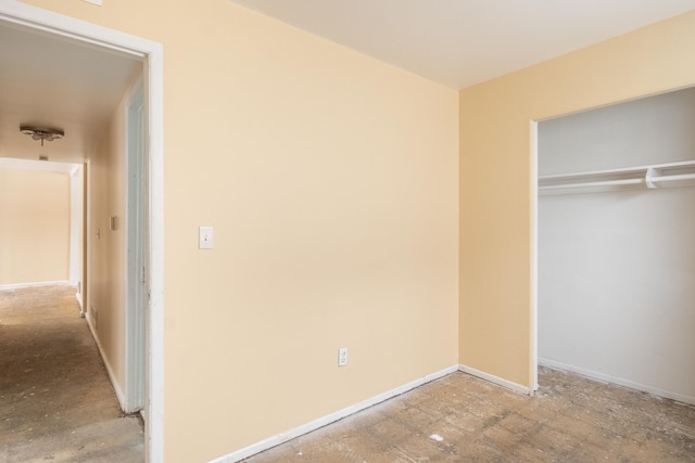 unfurnished bedroom featuring a closet