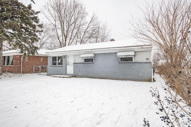 view of snow covered house