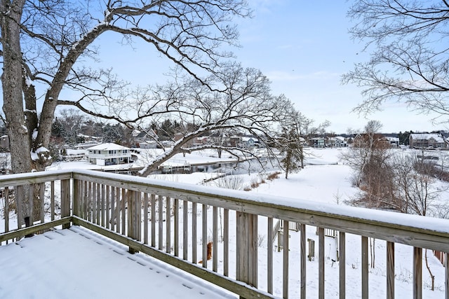 view of snow covered deck