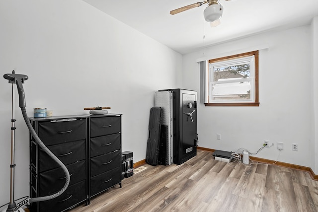 misc room featuring ceiling fan and light hardwood / wood-style flooring