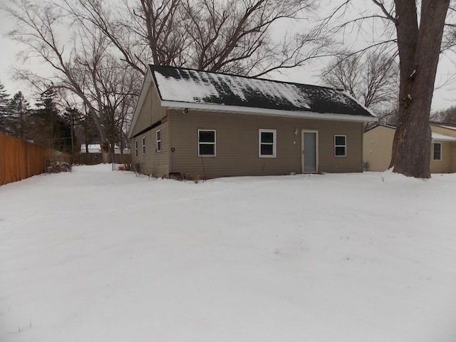 view of snow covered house