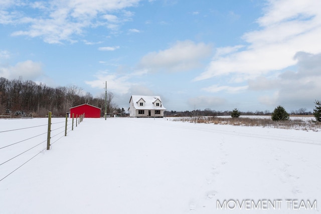 view of yard covered in snow