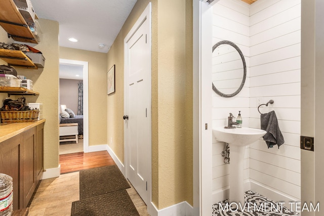 corridor featuring light hardwood / wood-style flooring