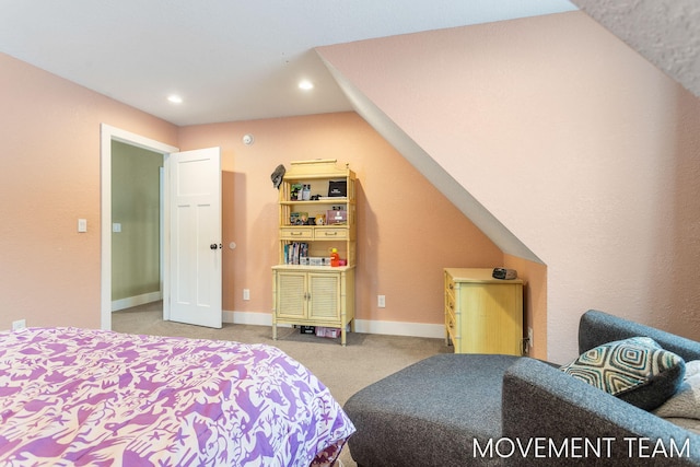 carpeted bedroom featuring vaulted ceiling