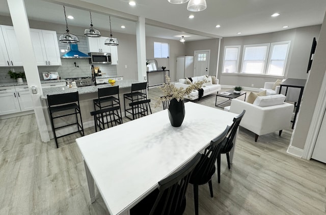 dining area featuring light hardwood / wood-style flooring