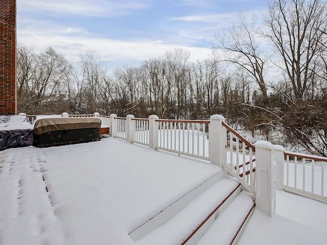 view of snow covered deck