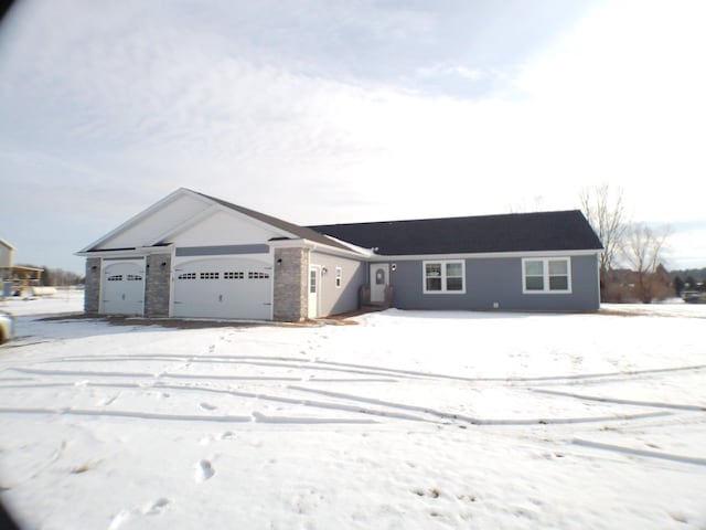 ranch-style home with a garage