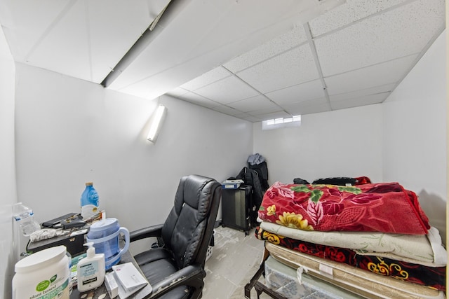 bedroom featuring a paneled ceiling