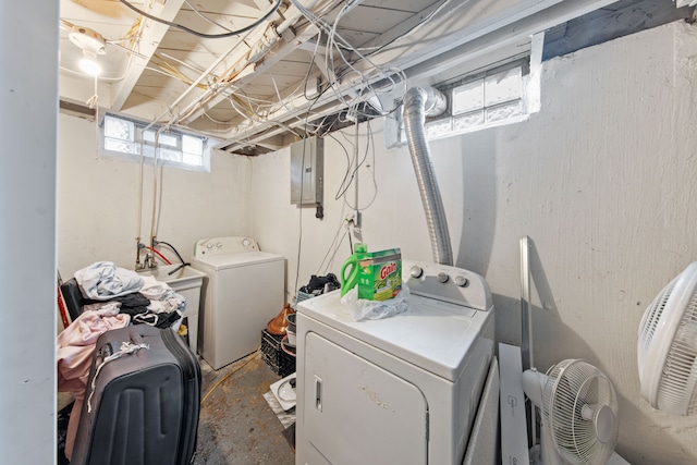 washroom featuring separate washer and dryer and electric panel