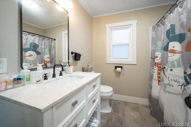 bathroom with toilet, vanity, tile patterned flooring, and crown molding