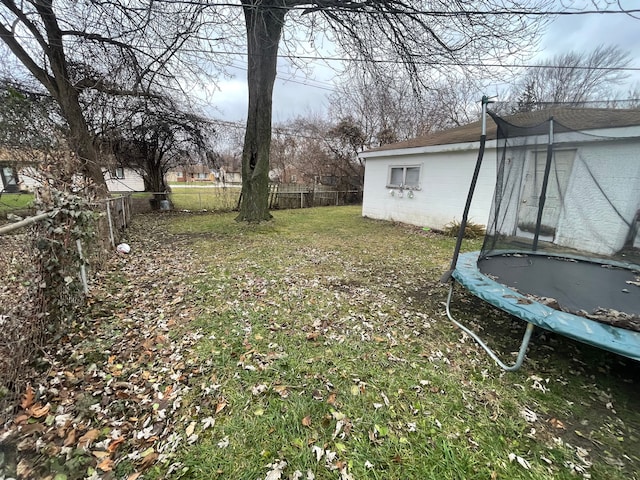 view of yard with a trampoline