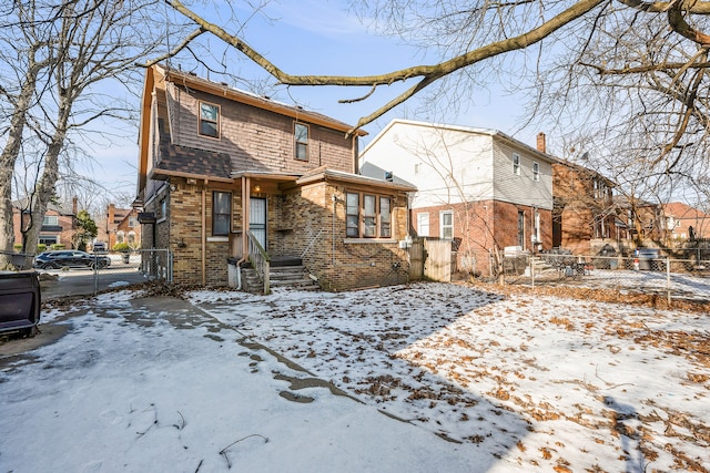 view of snow covered property