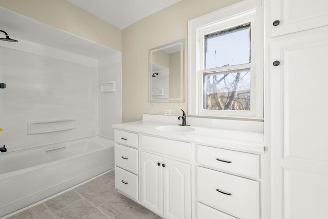 bathroom featuring shower / bathtub combination and vanity