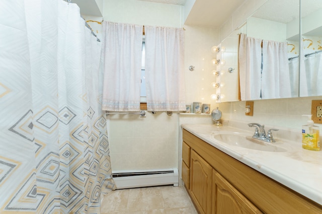 bathroom featuring a shower with curtain, tile patterned floors, vanity, and a baseboard heating unit