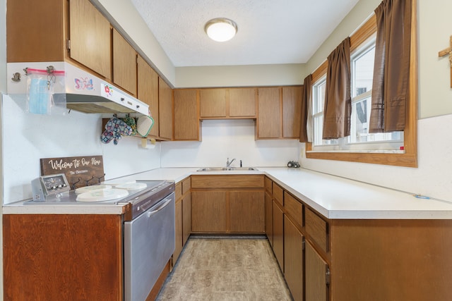 kitchen featuring sink, a textured ceiling, and stove