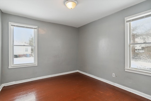 spare room featuring a wealth of natural light