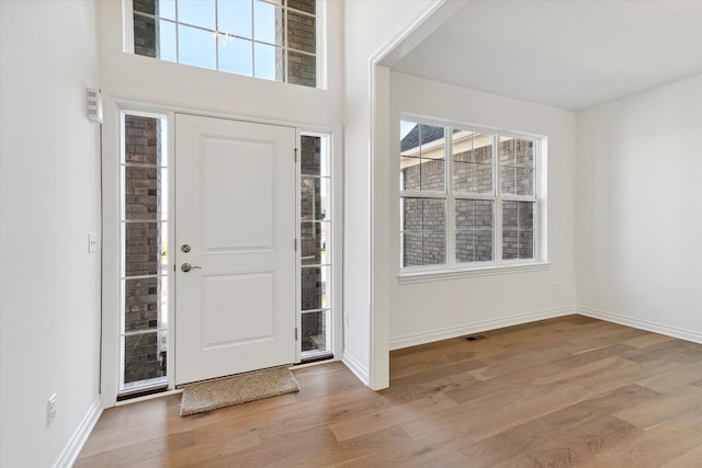 foyer featuring light wood-type flooring