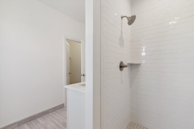 bathroom featuring tiled shower