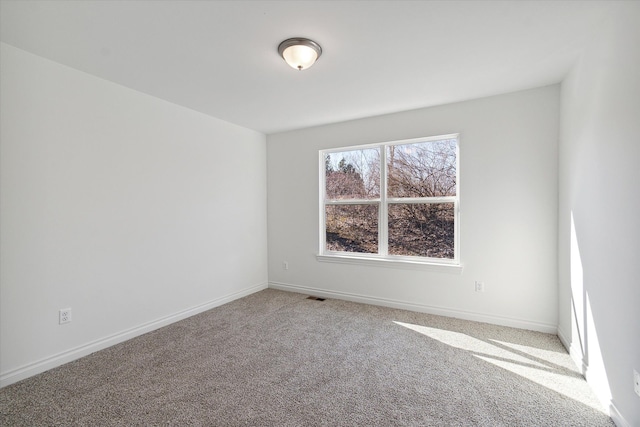 view of carpeted spare room