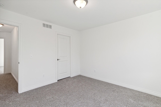 spare room with carpet