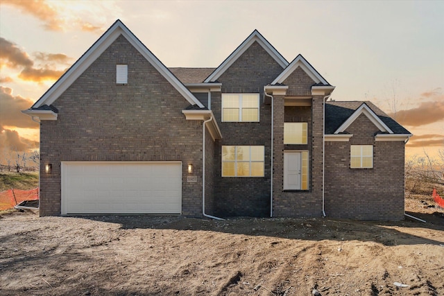 view of front of home with a garage