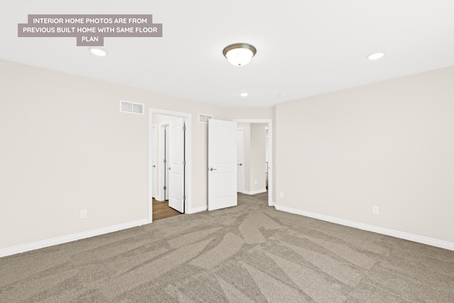 unfurnished bedroom with baseboards, visible vents, and recessed lighting