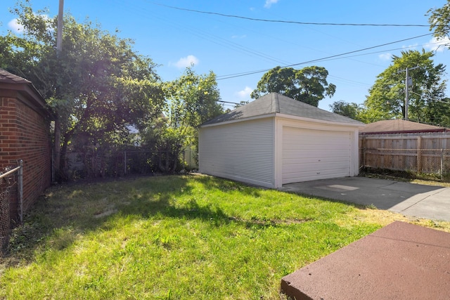 garage with a lawn