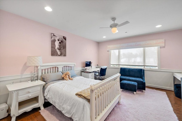 bedroom with dark wood-type flooring and ceiling fan