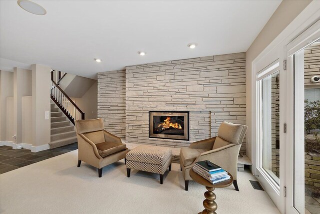 sitting room featuring a fireplace