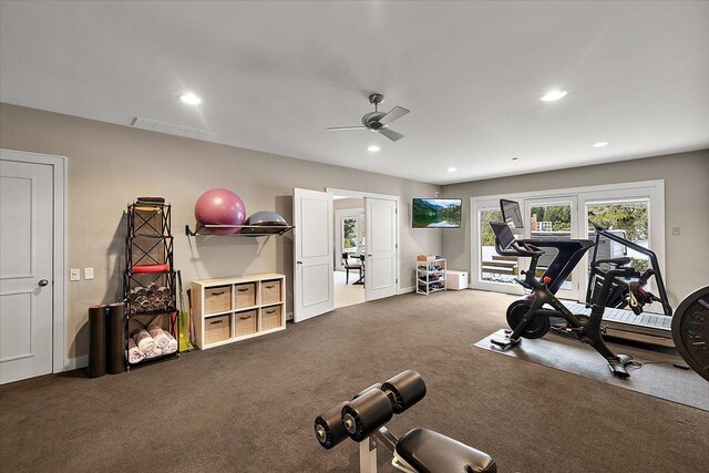 exercise room featuring carpet floors, ceiling fan, and french doors