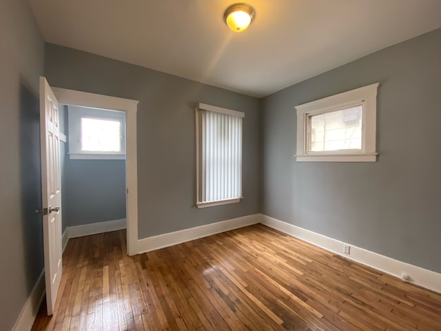 unfurnished bedroom featuring wood-type flooring