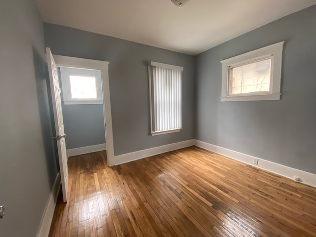 spare room with light wood-type flooring