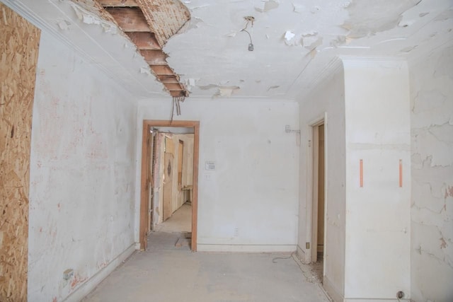 spare room with crown molding