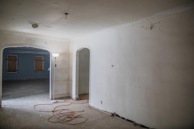 spare room featuring ornamental molding