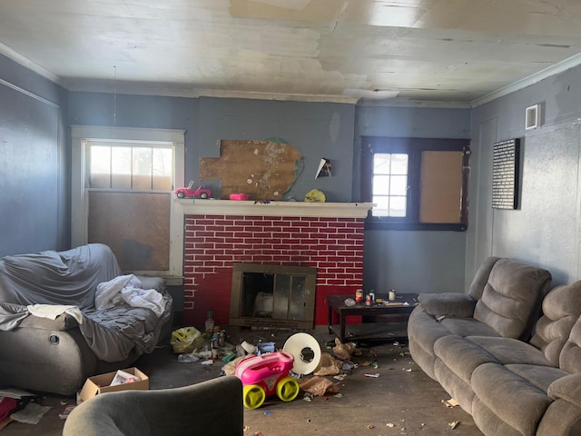 living room featuring crown molding, a fireplace, and concrete flooring