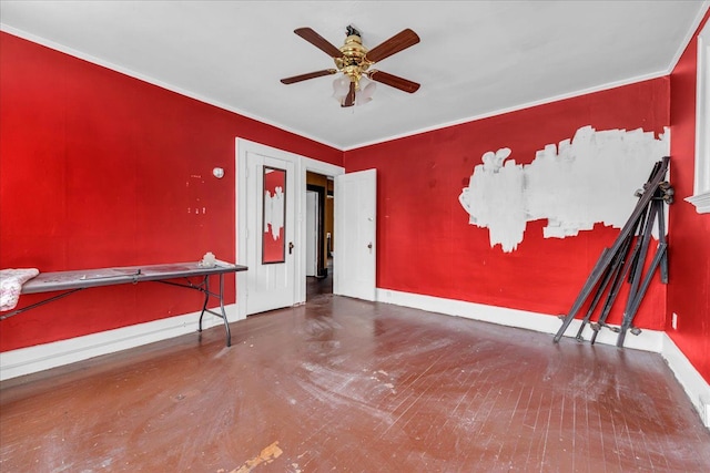 empty room with ornamental molding and ceiling fan