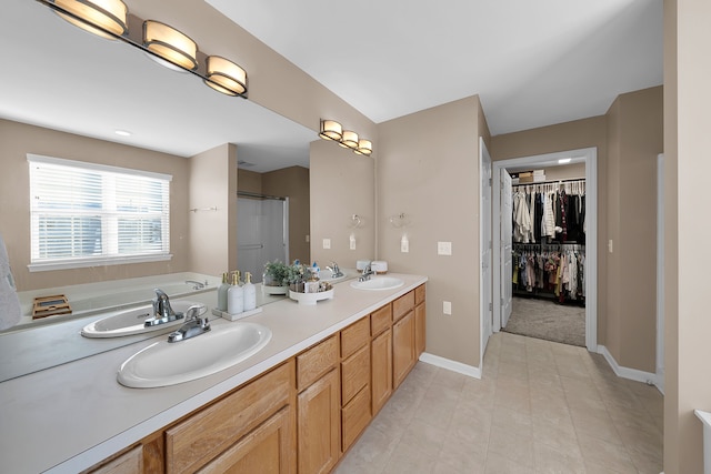 bathroom featuring a bathtub and vanity