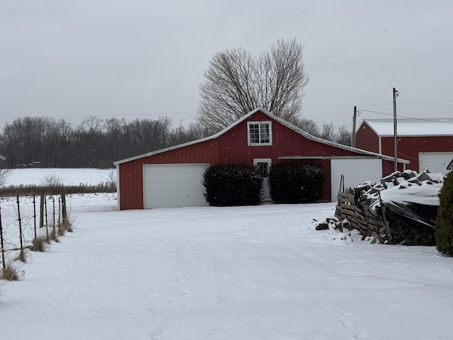 view of snow covered garage